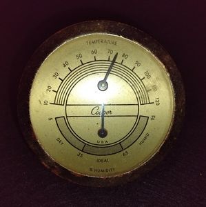 Vintage humidity and temperature gauge